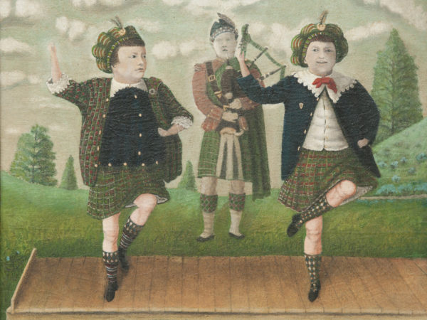 Two figures dressed in tartans and kilts dance on a raised wooden platform in a green landscape; a third figure behind them plays the bagpipes.