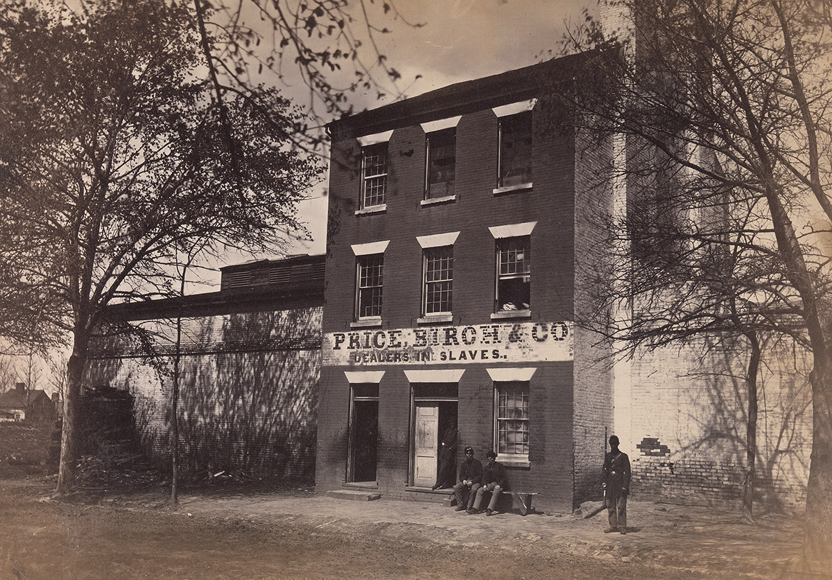 Three men in uniform stand and sit in front of brick building with a painted sign reading: Price, Birch and Co., Dealers in Slaves.